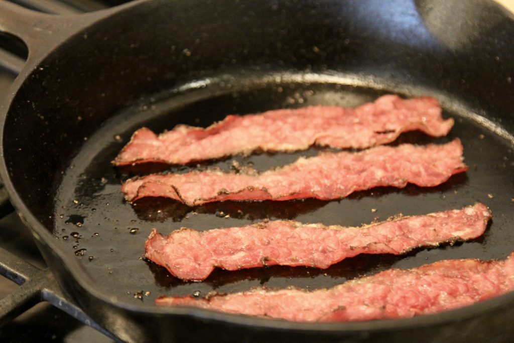 pastrami bacon - fry in skillet (c)thejoyofeatingwell