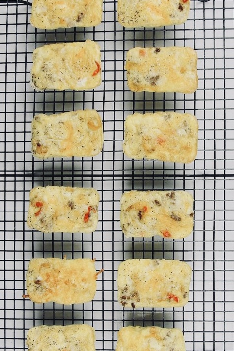 Overhead shot of Starbucks egg bites in the oven (c)thejoyofeatingwell